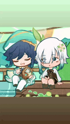 a boy and a girl are sitting next to each other .