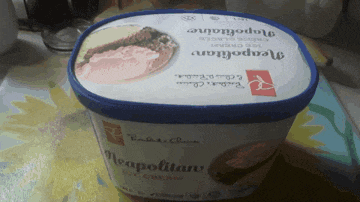 a container of ice cream that says napoletana on it