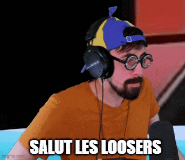 a man wearing headphones and goggles says salut les looser 's