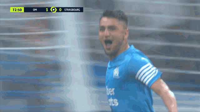 a soccer player with the number 9 on his jersey celebrates a goal