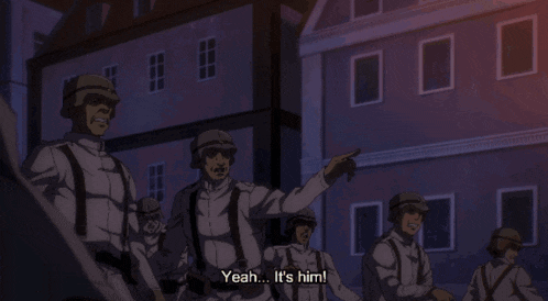 a group of soldiers are standing in front of a building and one of them says " yeah ... it 's him "