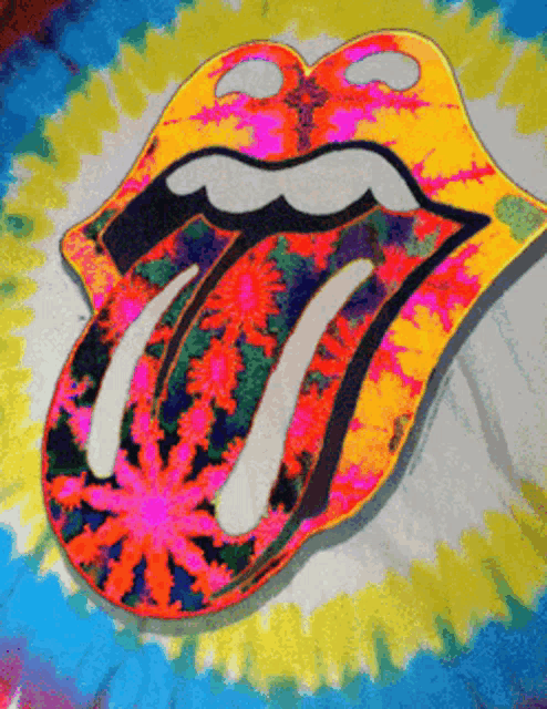 a colorful rolling stones tongue with a marijuana leaf on it