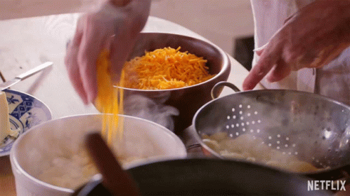 Adding Cheese High On The Hog How African American Cuisine Transformed America GIF - Adding Cheese High On The Hog How African American Cuisine Transformed America Cooking GIFs