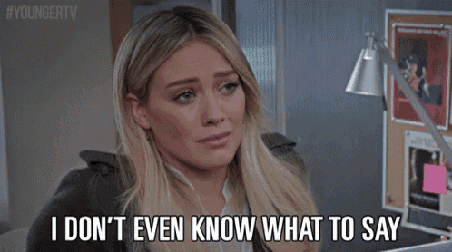 a woman is sitting in front of a laptop and says i don 't even know what to say .