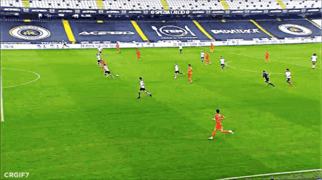 a soccer game is being played in an empty stadium with a banner that says spezia caldo on it