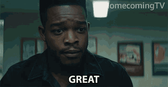a man says " great " in front of a homecoming tv logo