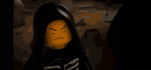 a lego character wearing a black hood has an angry face on his face