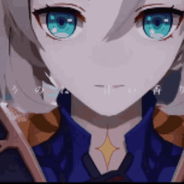 a close up of a girl with blue eyes and a star on her chest