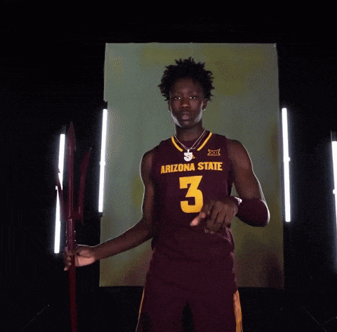 a man wearing a arizona state jersey number 3