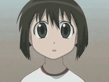 a close up of a girl 's face with a red collar