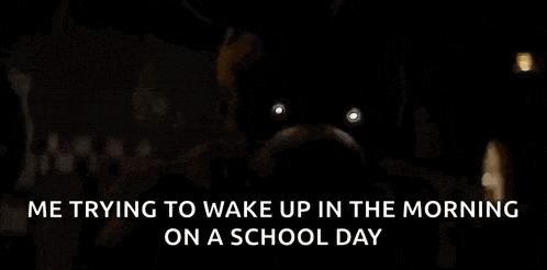 a teddy bear is sitting in a dark room with the words `` me trying to wake up in the morning on a school day '' .