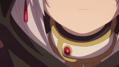 a close up of a person wearing a necklace with red stones