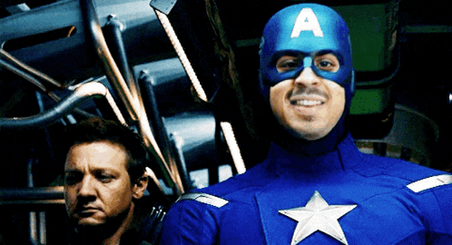 a man in a blue captain america costume with a white star on his chest