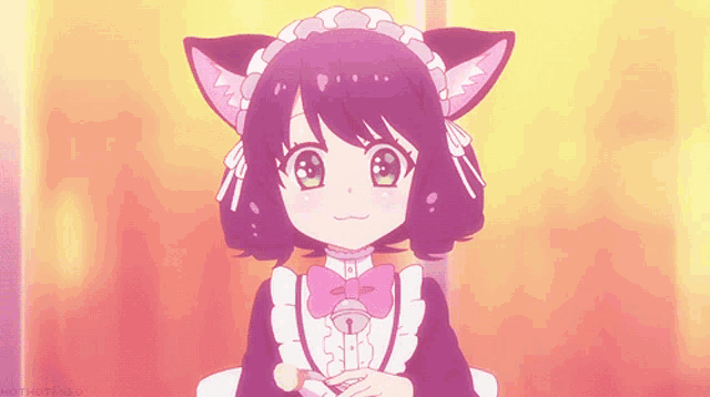 a girl with cat ears is wearing a pink maid outfit