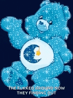 a care bear with a crescent moon on its belly is surrounded by glitter and stars .