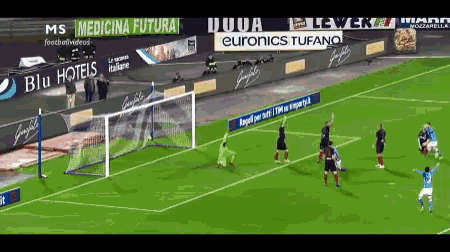 a soccer game is being played on a field with advertisements for euronics tufano and blu hotels