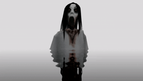 a black and white image of a ghost with long hair screaming