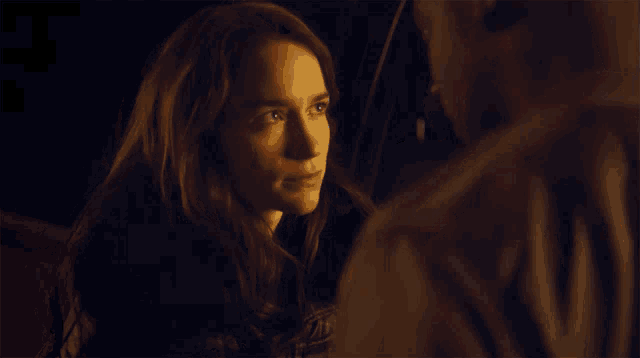 a man and a woman are looking at each other with the word promise written above them