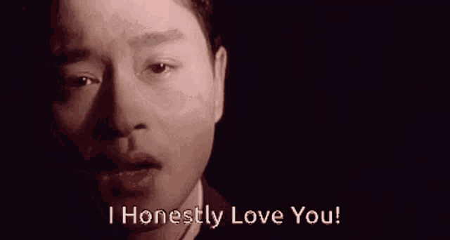 a close up of a man 's face and the words " i honestly love you "