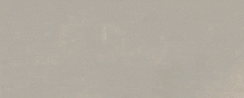 a close up of a cardboard box with the word milk written on it