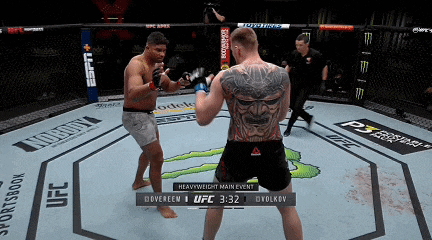 two men are fighting in a ufc ring and the ufc heavyweight main event is shown
