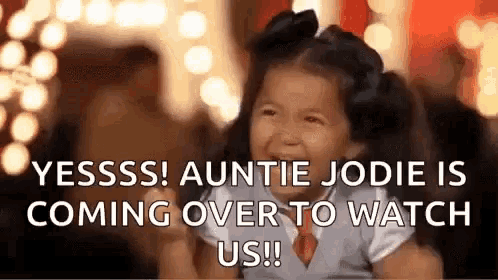 a little girl is crying and smiling with the words `` yesssss auntie jodie is coming over to watch us '' .