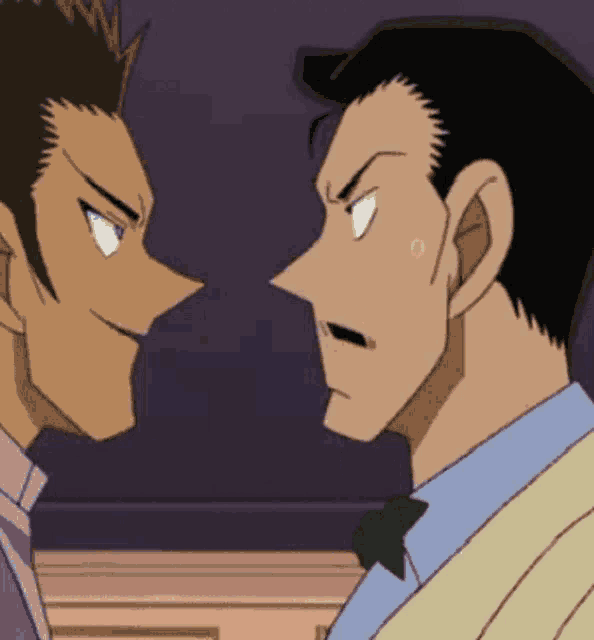 two men are looking at each other and one has a tear coming out of his eye