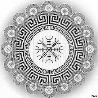a black and white mandala with a greek key pattern and a snowflake in the center .