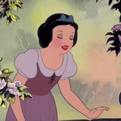 snow white from snow white and the seven dwarfs is standing in front of flowers