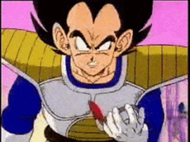 a close up of a dragon ball z character holding a red object