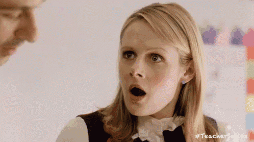 a woman with her mouth open and a surprised look on her face .