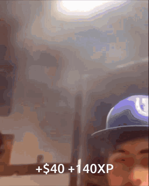 a man wearing a purple hat with the words $ 40 + 140xp on the bottom