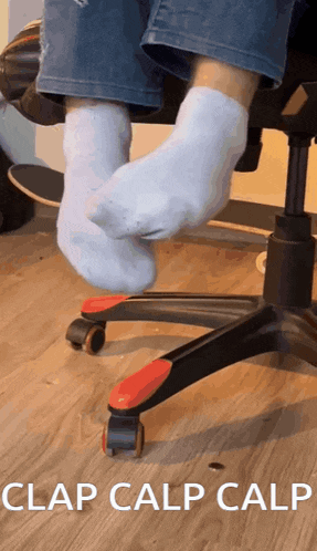 a person wearing white socks is sitting on a chair with the words clap calp calp on the bottom