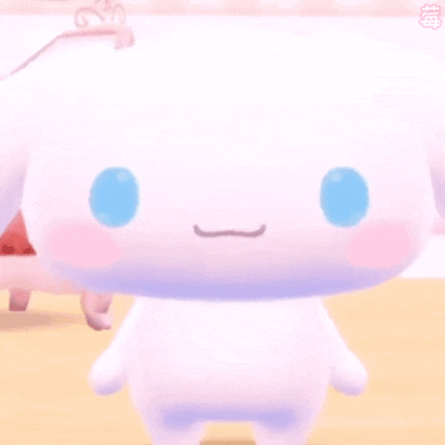 a white stuffed animal with blue eyes and a smile on its face is walking on a table .