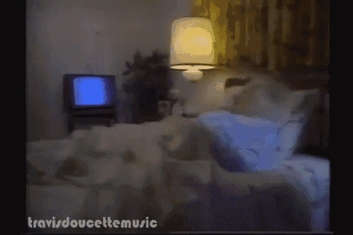 a blurred image of a person laying on a bed with the words travisdoucellemusic written below them