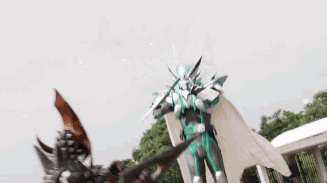 a statue of a man with a sword is being attacked by a giant robot .