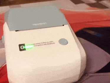 a nimbot printer is sitting on a table