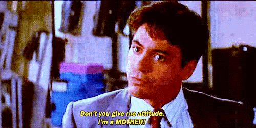 a man in a suit and tie is saying " don 't you give me attitude i 'm a mother "