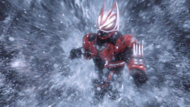 a man in a red and black armor is surrounded by water and snow