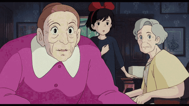 a girl with a red bow on her head is standing next to two women