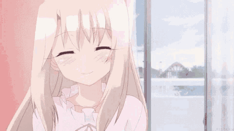 a girl with long white hair is smiling with her eyes closed and a cat ear on her head .