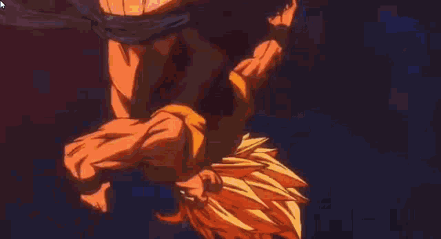 a close up of a dragon ball z character 's face with a glowing orange hair .