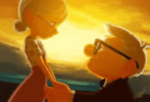 a man and a woman are standing next to each other holding hands .