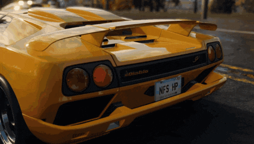 a yellow lamborghini diablo with a california license plate