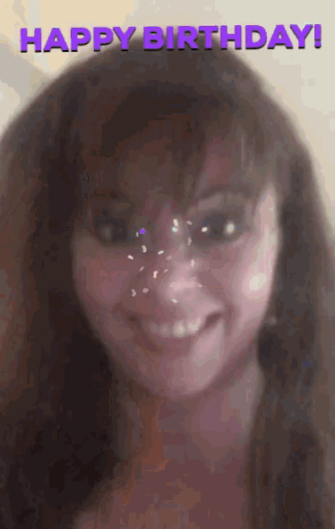 a girl with sprinkles on her face and the words happy birthday