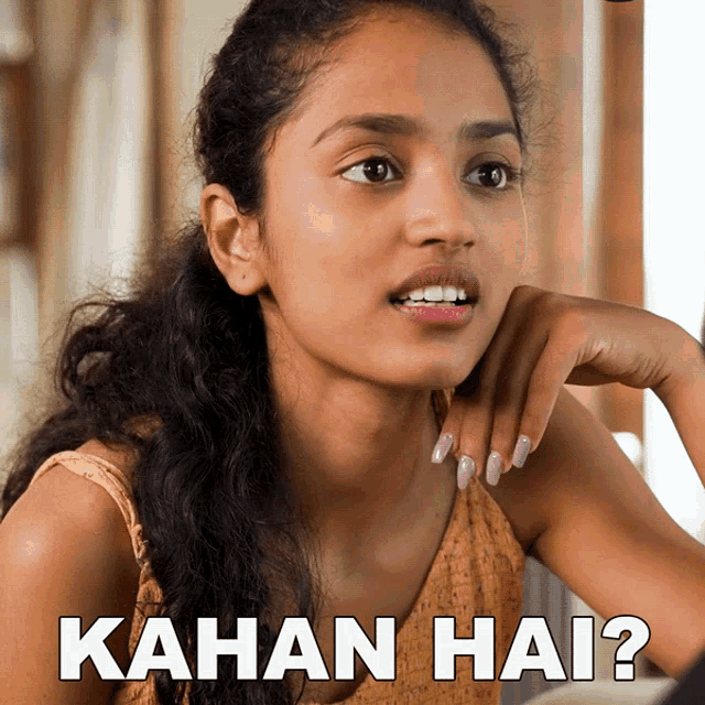 a woman with a questioning look on her face and the words kahan hai below her