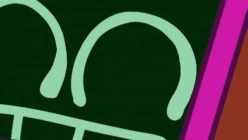 a yellow duck with a black t on its face is next to a green object