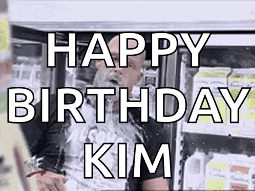 a man with a beard says happy birthday kim in front of a refrigerator