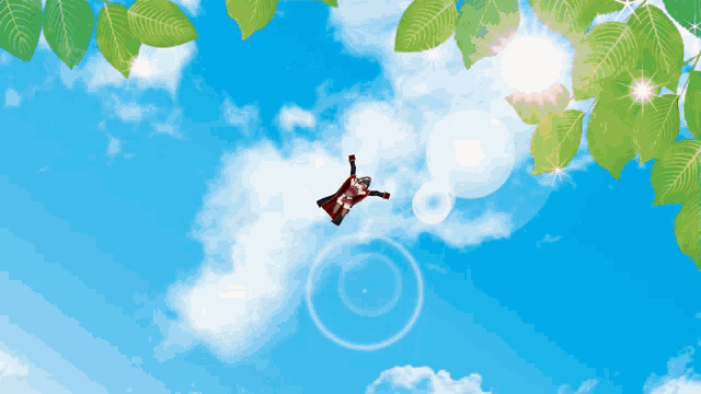 a person in a cape is flying through the air
