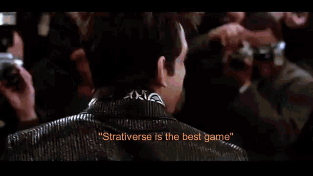 a man says " stratverse is the best game " in front of a crowd of people